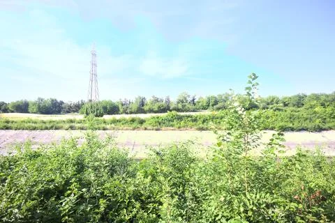 Fields over a channel Stock Photos