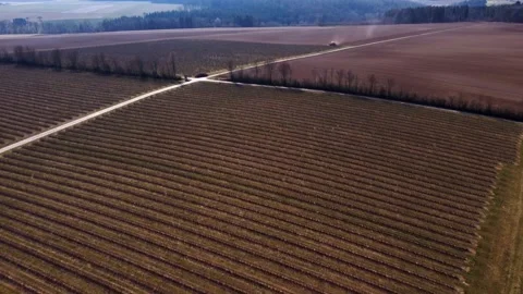 Fields plowed by tractor Stock Footage 172376833