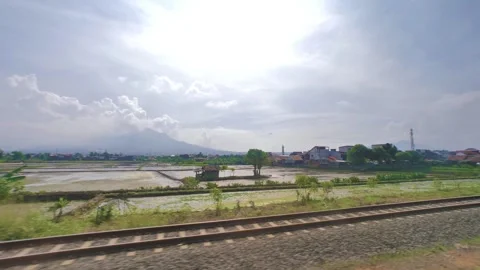 Fields Rail and Mountains Ultra Wide Bright Sun Stock Footage 280378826