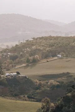 Fields, rolling hills, and birds. Ronda, Spain Stock Photos