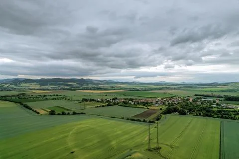 Fields. Sown fields. Field of rye, wheat. Top view. Green fields near the vil Stock Photos