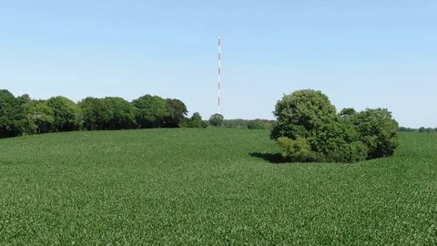 Fields with a TV Antenna Drone Shot. Stock Footage (Ungraded) Stock Footage 113053250