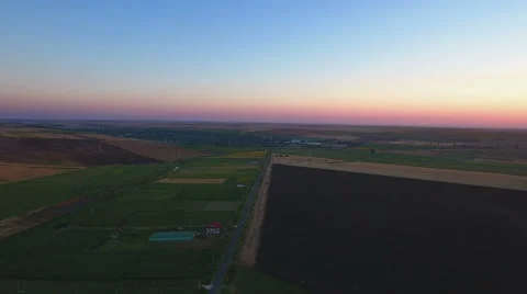 Fields with various types of agriculture, aerial shot at sunset Stock Footage 65632651