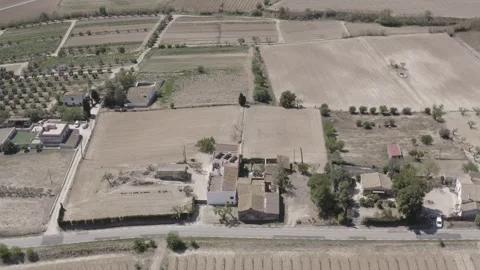Fields with vineyards, olive trees,... from the dry season, with aerial Stock Footage 280405911