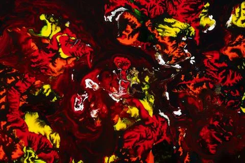 Fiery Abstract Floral Pattern with Red Yellow and Black Swirling Paint Stock Photos