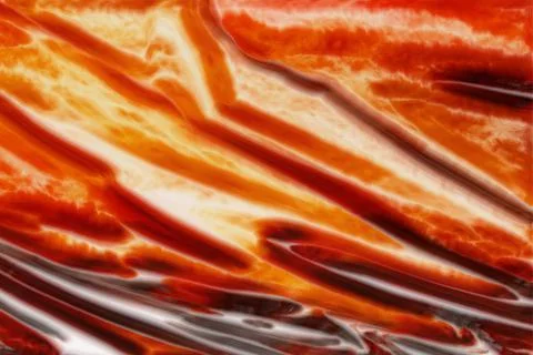 A fiery abstraction with streams of red-hot lava. Orange textures.  Stock Illustration