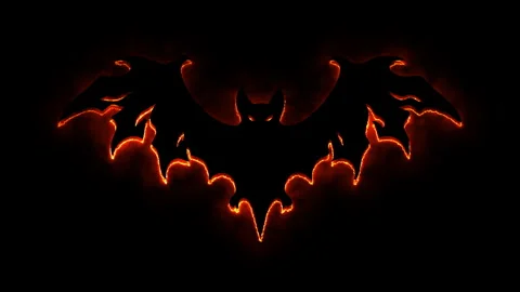 Fiery bat silhouette with glowing eyes appears in darkness, spooky hallowee.. Stock Footage 339073288