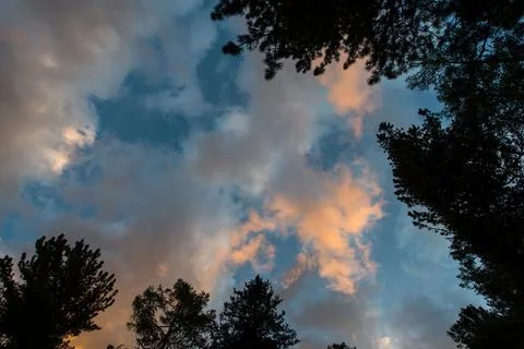 Fiery clouds at sunset in the Altai mountains Stock Photos
