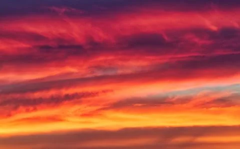 Fiery Clouds at Sunset Stock Photos