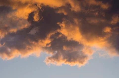 Fiery Clouds in Sunset Sky Stock Photos