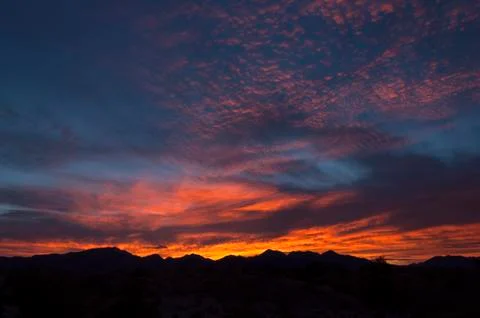 Fiery dawn sky Stock Photos