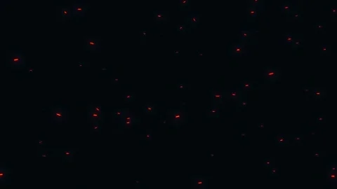 Fiery embers glow and float upwards against black background motion Stock Footage 327511287