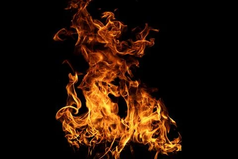 Fiery explosion background. Flame pattern. Flames on black backdrop. Glowing Stock Photos