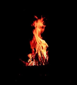 Fiery flames on a black background. Stock Photos