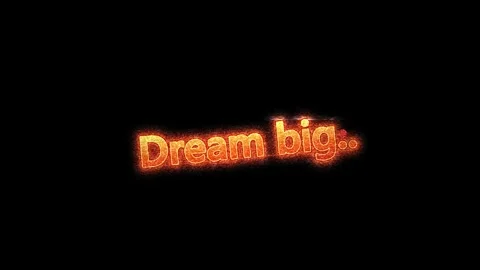 Fiery glowing text animation revealing motivational dream big message against Stockbeeldmateriaal 345127854