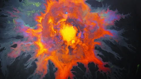 Fiery Ink Reaction Forming Cosmic Explosion Pattern in Macro Stockbeeldmateriaal 346604811