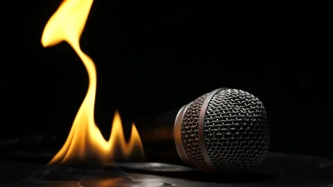 Fiery match lighting microphone on fire music illustration isolated black Stock Footage 234390488