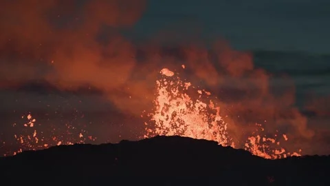 Fiery molten lava exploding from volcano crater Litli-Hrútur in Iceland Stock Footage 246899666