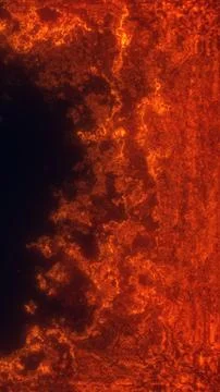 Fiery molten lava texture with glowing orange cracks and dark volcanic surf.. Stock Illustration