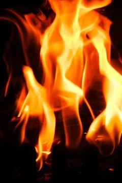 Fiery orange flames Stock Photos