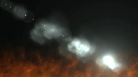 Fiery orange flames rising against dark background with bright white lens flare Stock Footage 345213448