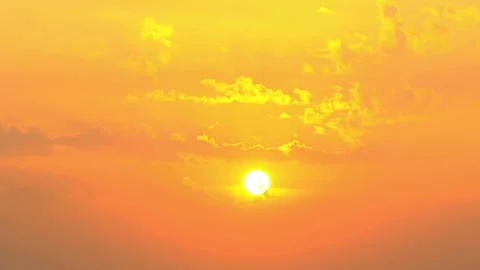 Fiery orange sunrise time lapse with clouds and rising sun Stock Footage 332874086