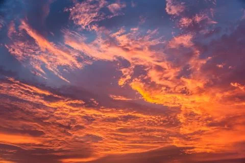 Fiery orange sunset sky Stock Photos