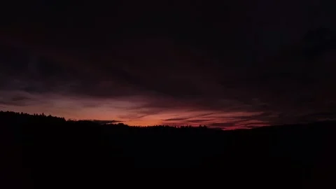 Fiery, peaceful sunset, slow downward movement, drone shot. Stock-Footage 140220682