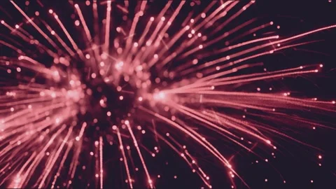 Fiery pink fireworks exploding against dark night sky with glowing particle 스톡 동영상 345137128