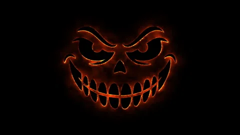 Fiery pumpkin face animation with glowing orange eyes and scary smile for h.. Stockbeeldmateriaal 339074106