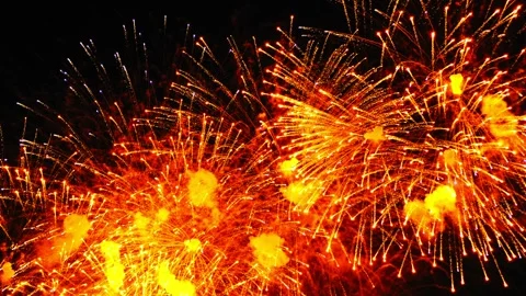 Fiery red bright fireworks flashes on the black night sky. Medium plan. Stock Footage 252832950