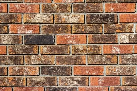 Fiery red clay brick wall texture background Stock Photos
