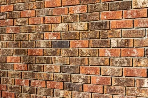 Fiery red clay brick wall texture background Stock Photos