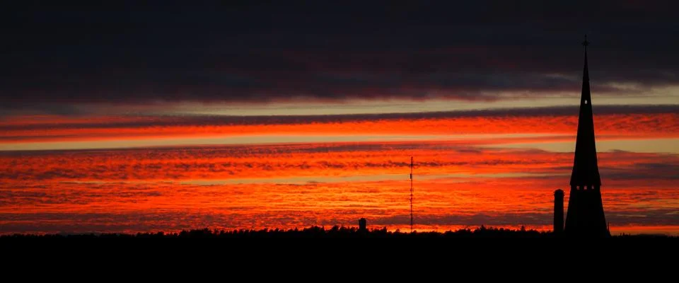 Fiery red sunset clouds Stock Photos