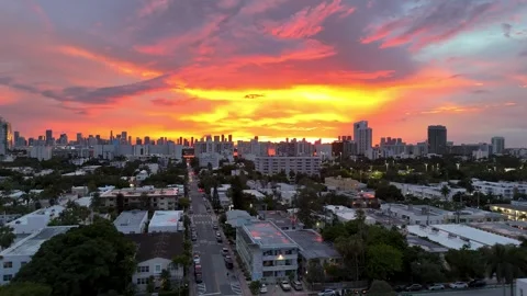 Fiery Red Sunset over Miami Skyline and Biscayne Bay Stock Footage 316785967