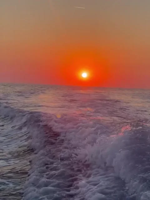 Fiery Red Sunset Over Moving Ocean Waves Stock-Footage 339882069