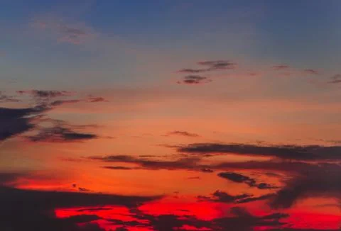 Fiery red sunset sky background Stock Photos