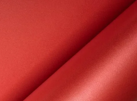 Fiery ruby red paper background with a pearlescent, glossy texture and Stock Photos