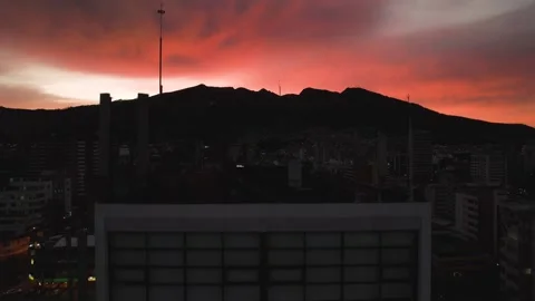 A Fiery Sunset Behind an Office Highrise Stock Footage 157138590