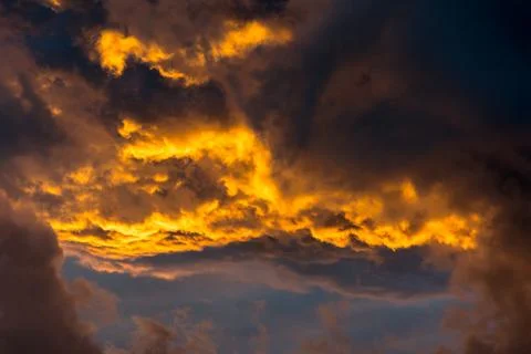 Fiery Sunset Clouds Sky Detail Orange Blue Closeup Stock Photos