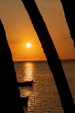 Fiery sunset over the lagoon Stock Photos