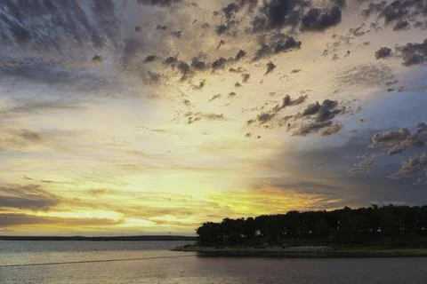 Fiery Sunset Over A Lake Stock Photos