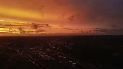 Fiery sunset over the river and over the city Stock Footage 205833900