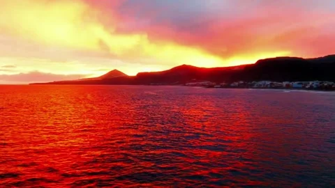 Fiery Sunset Over Tranquil Red Ocean Waves Stock Footage 310856436