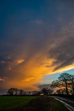 Fiery sunset road Stock Photos