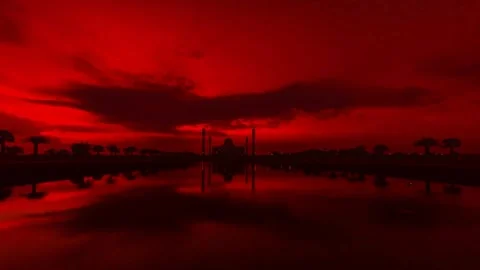 Fiery Sunset Silhouette of Mosque and Palm Trees Reflected in Water Video stock 310375555