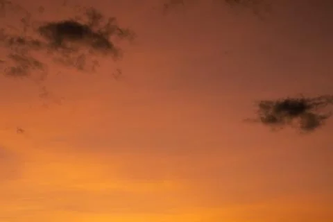 Fiery Sunset Sky with Clouds Stock Photos
