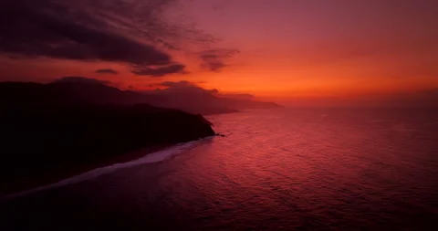 Fiery sunset sky colors over Tayrona Los Naranjos coastline in Colombia Video stock 344365032