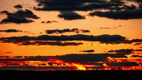 Fiery Sunset Sky Timelapse, Dark Clouds, Bright Orange Light Stock Footage 305141425