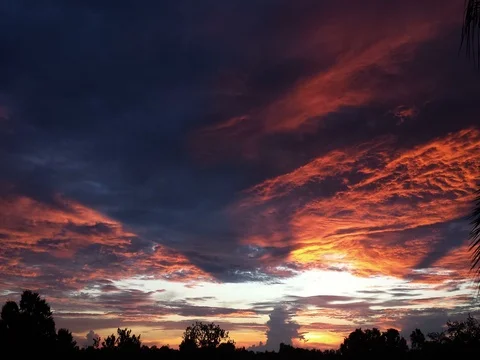 Fiery Sunset Time Lapse (2160p 24fps) Stock Footage 77166302